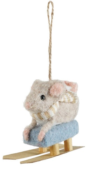 A felted wool mouse ornament sitting on a small wooden sled with a blue seat, hanging by a natural jute rope against a plain white background.