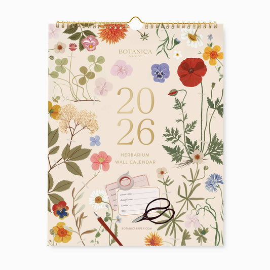 2026 Herbarium Wall Calendar featuring hand-painted pressed floral illustrations with gold foil details on the cover.