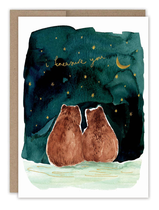Greeting card with two bears under a night sky with stars and moon.
