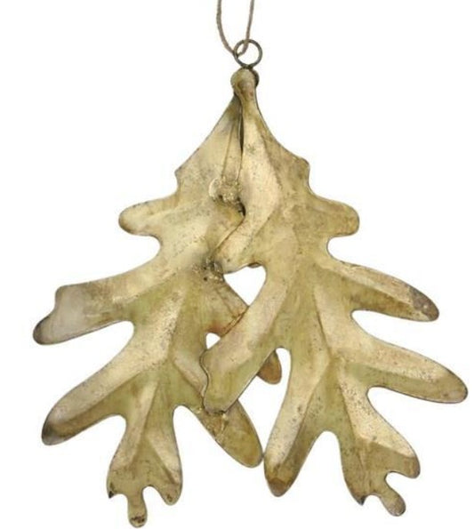 Pair of brass-finished metal oak leaf ornaments, 5.5 by 6.5 inches, versatile fall and Christmas holiday decoration for wreaths, mantels, or tables.