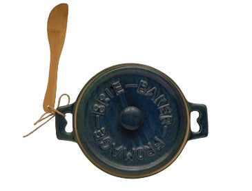 Vintage-style blue bell with wooden handle on a white background