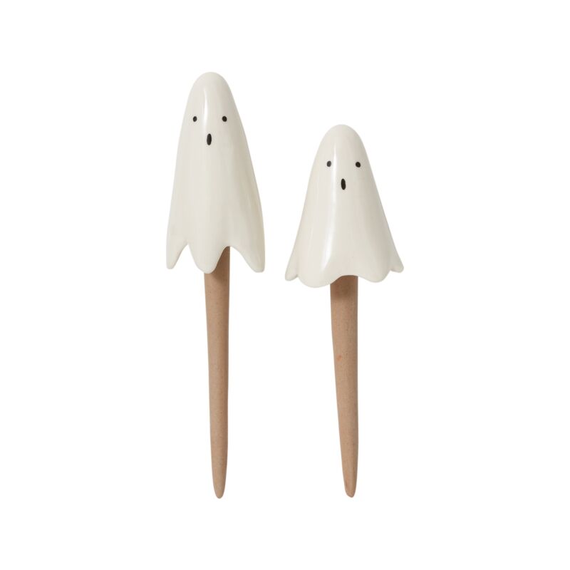 two ceramic ghost plant picks on wooden stakes, spooky Halloween decorations for houseplants and seasonal home décor.