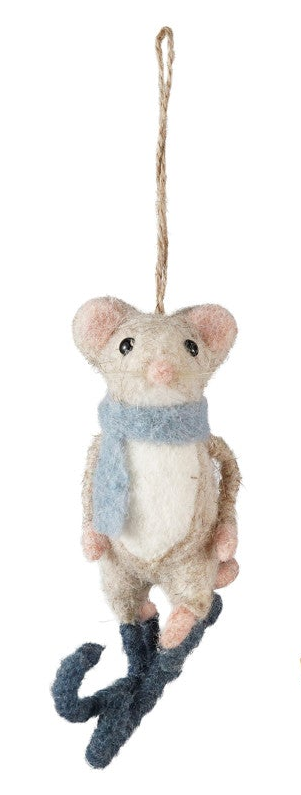 A felted wool mouse ornament wearing a light blue scarf and dark blue boots, hanging from a natural jute string against a plain white background.