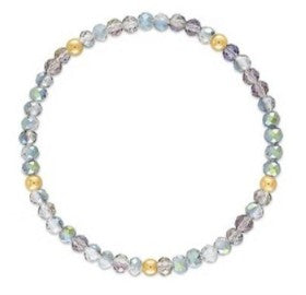 A beaded stretch bracelet featuring faceted round beads in pastel shades of blue, green, gray, and lavender, accented with a few small metallic gold beads, shown on a plain white background.