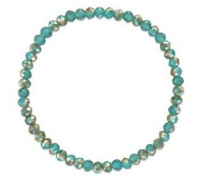 A beaded stretch bracelet made of faceted round beads in turquoise blue with iridescent silver and green metallic reflections, shown on a plain white background.