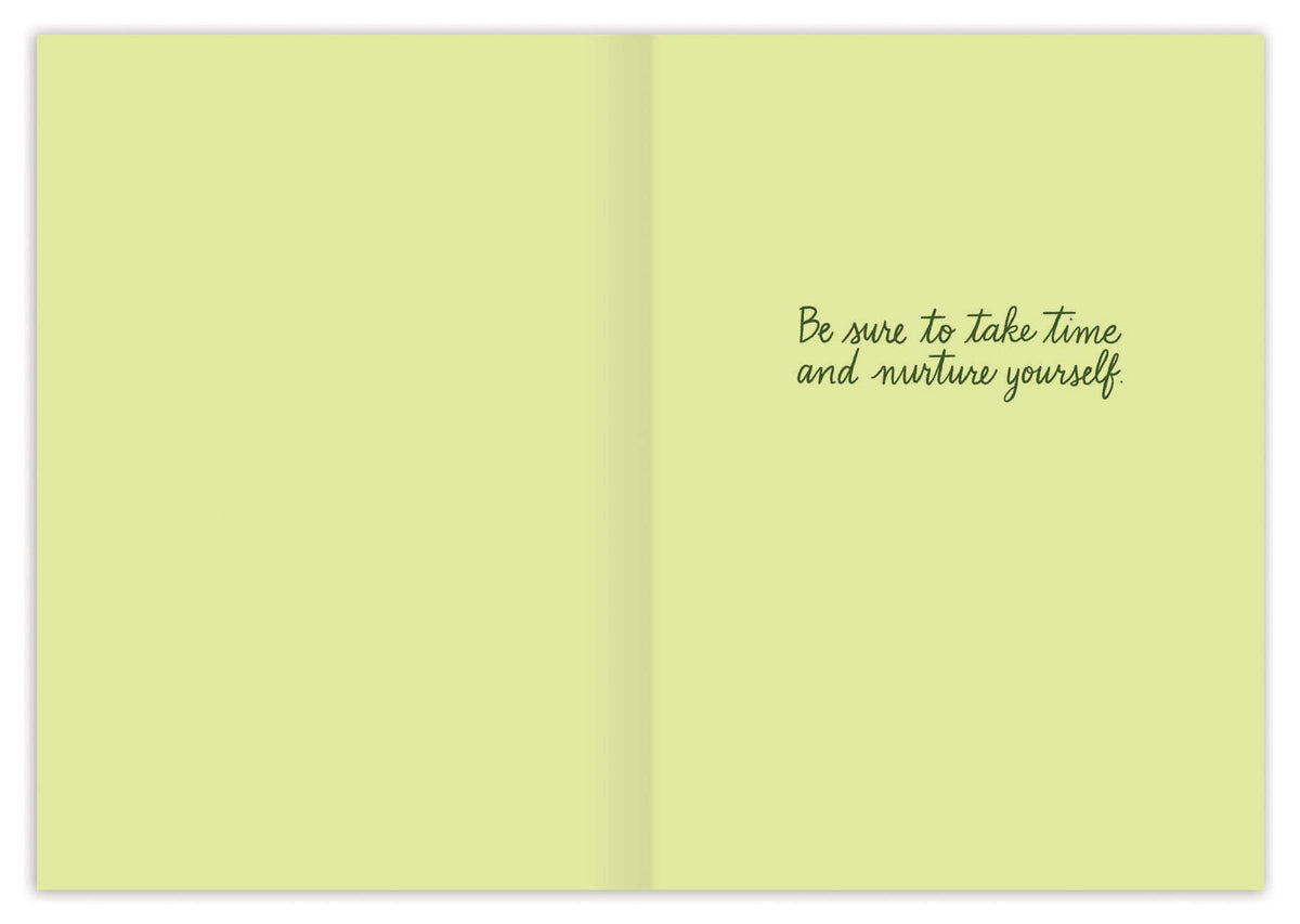 Open card with a motivational quote on a light green background