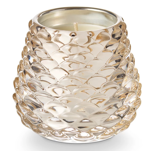 Winter White Pinecone Votive Candle by Illume in frosted pinecone-shaped glass with cardamom, evergreen, and citrus fragrance notes.