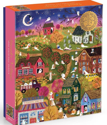 1000-piece puzzle depicting a whimsical haunted village with glowing windows, ghostly figures, and reflective foil accents catching the light.