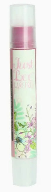 Lip balm with floral design on a white background