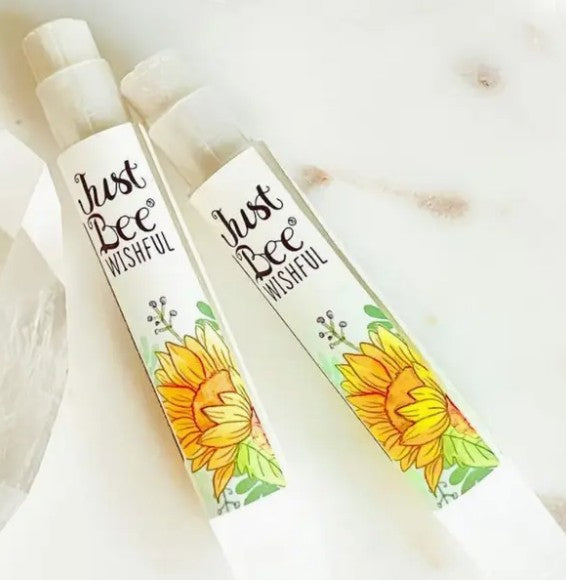 Two 'Just Bee Wishful' products with sunflower designs on a white background