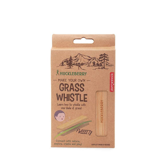 Kikkerland Huckleberry Grass Whistle made of eco-friendly bamboo, demonstrating how to whistle using a blade of grass outdoors.