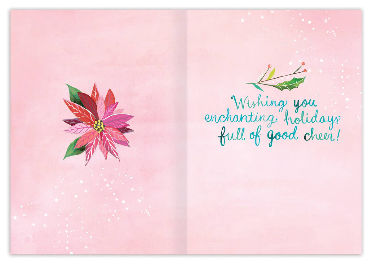 Greeting card with poinsettia flower and holiday message on pink background