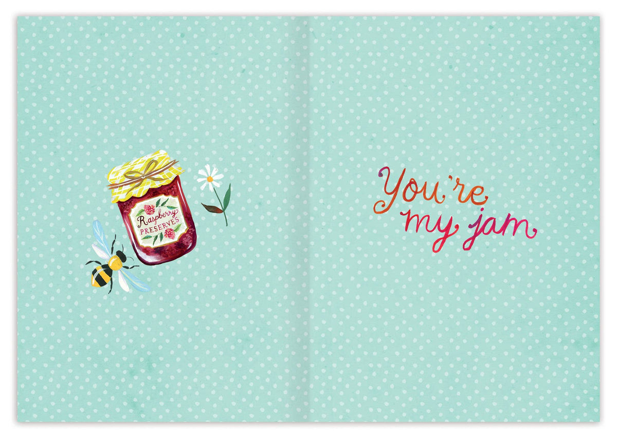 Card with a jar of jam, bee, and flowers on a polka dot background with 'You're my jam' text.