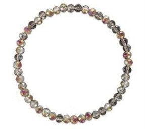 A beaded stretch bracelet made of small, faceted round beads in a mix of gray, brown, and pinkish tones, arranged in a circular shape on a plain white background.