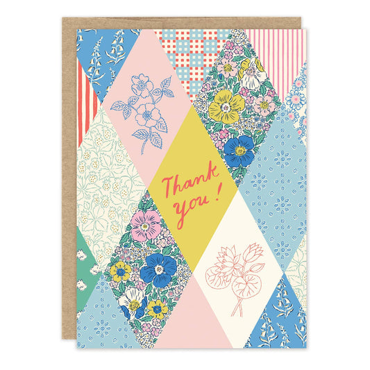 Colorful patchwork-style card with floral patterns and 'Thank you!' text on a white background.