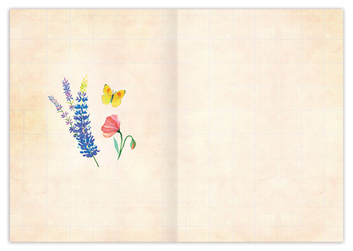 Open notebook with floral illustration on a beige background