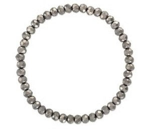 A beaded stretch bracelet made of small, faceted metallic gray beads, arranged in a circular shape against a plain white background.