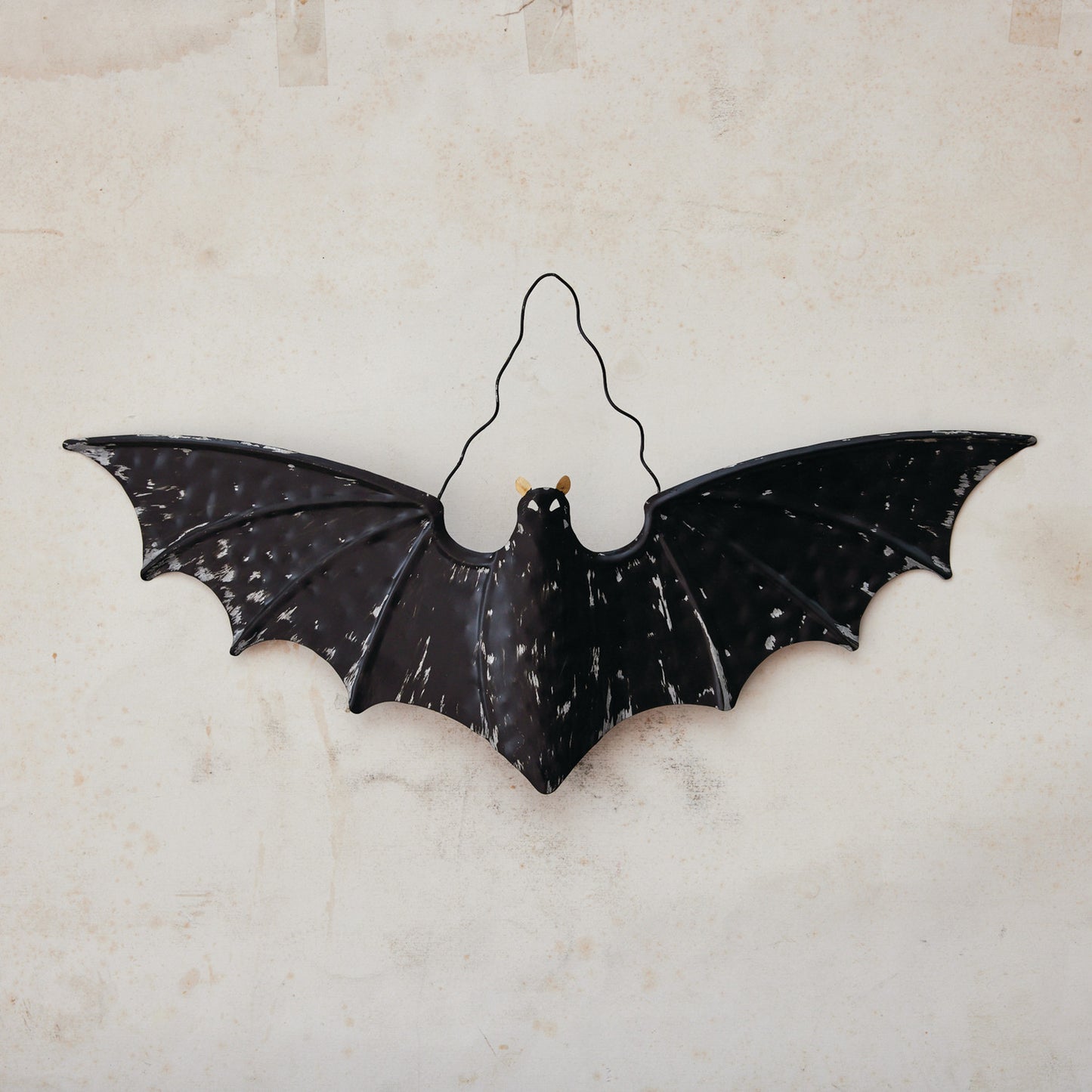 Spooky Metal Hanging Bat, 14.8" tall, crafted from metal, ideal for Halloween décor on porches, windows, or indoors.