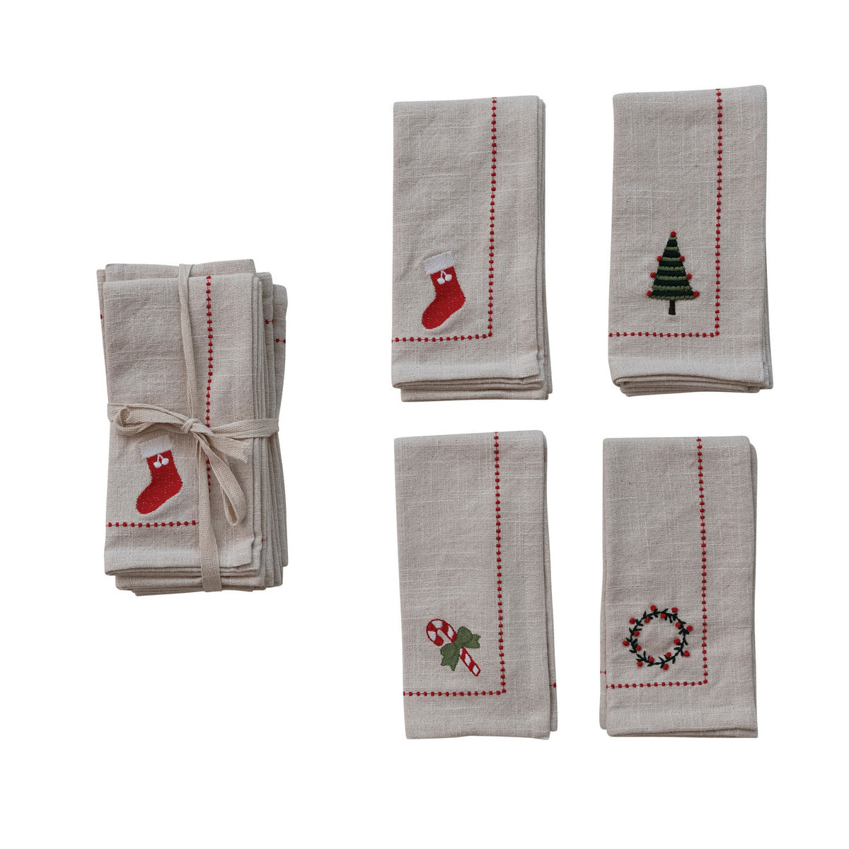 Set of four embroidered napkins with Christmas designs on a white background