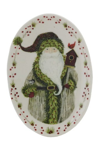 Stoneware Christmas plate featuring Santa with a birdhouse and a red berry and greenery border.