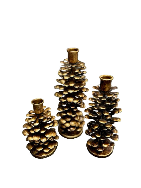 aged brass pinecone taper candle holders, woodland-inspired home décor for cottagecore style, autumn, or Christmas.