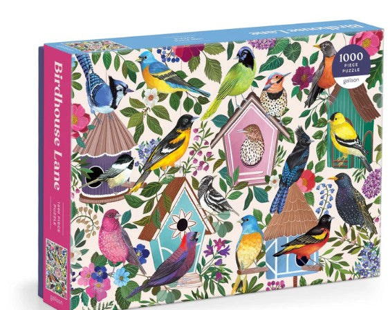 1000-piece Birdhouse Lane puzzle featuring whimsical, colorful birdhouses in a garden scene