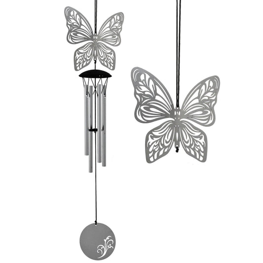 Woodstock Flourish wind chime with filigree butterfly design and silver tubes.