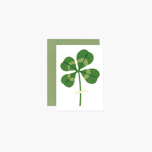 Four-leaf clover graphic on a white background