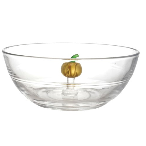 Clear glass bowl with a small gold and green decorative figure standing in the center, shown on a plain white background.