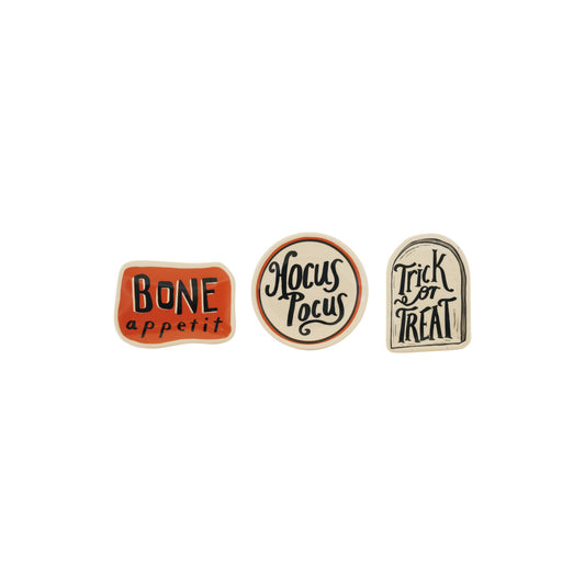 Three Halloween stoneware trinket dishes with Bone Appétit, Hocus Pocus and Trick or Treat sayings.