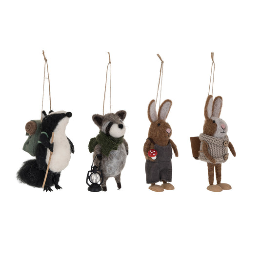 Handmade wool felt woodland animal ornaments with charming outdoor details.