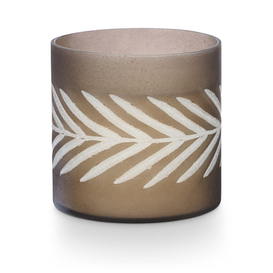Illume Gather Woodfire Glass Candle in frosted mercury glass with leaf design, featuring fragrance notes of smoky cedar, suede, and amber.