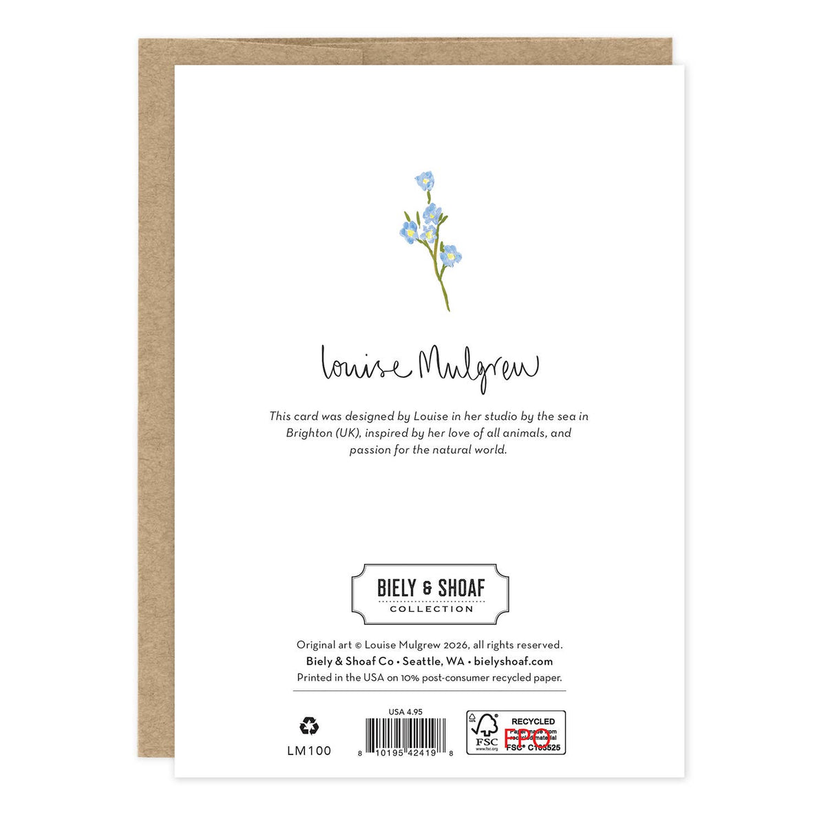 A white greeting card with a small blue flower illustration and black text, shown with a kraft brown envelope behind it on a white background.