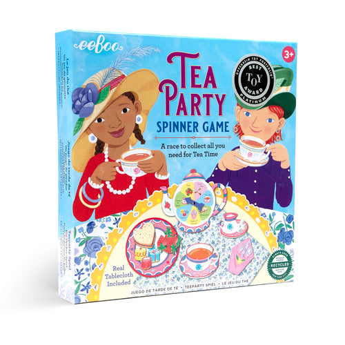 Tea Party Spinner Game for kids with teapot spinner, pretend tea party foods, plates, and colorful fabric tablecloth for imaginative preschool play.
