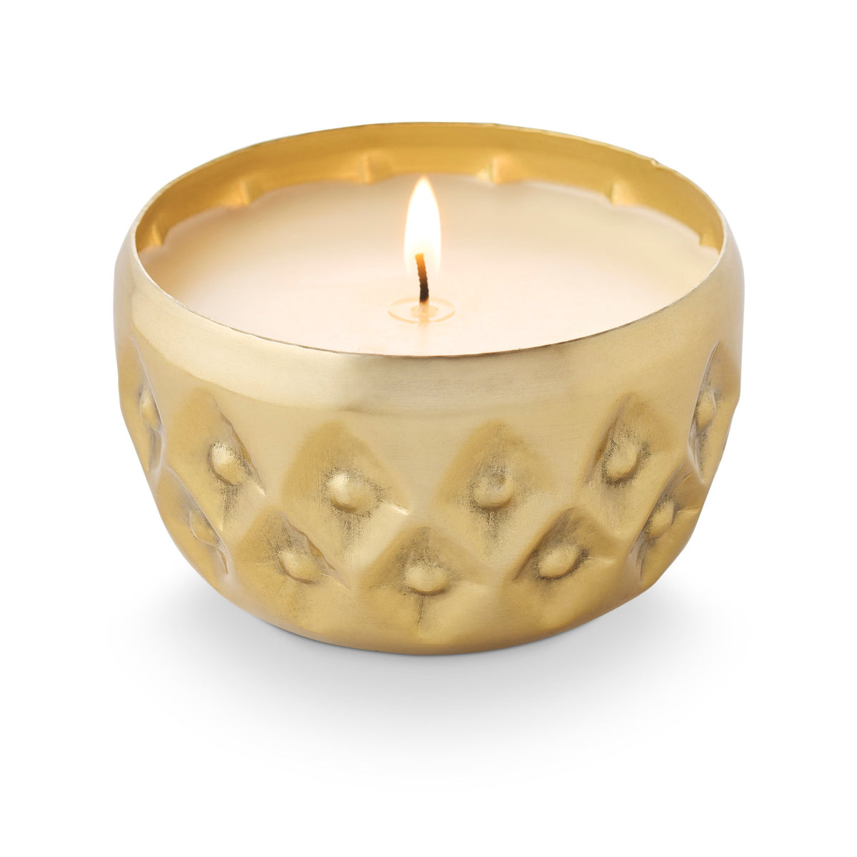 Winter White Radiant Pressed Metal Candle in a decorative gold-toned textured vessel.