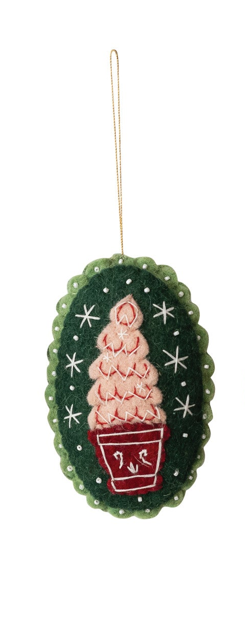 Wool felt Christmas ornament with embroidered tree in a red pot, beaded details, and scalloped trim.